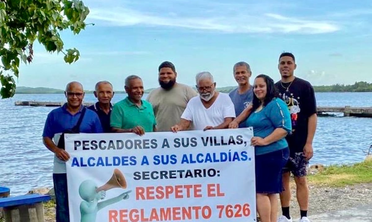 Pescadores denuncian que secretario de Agricultura y el BDE pretenden removerlos de la Villla Pesquera en Ceiba
